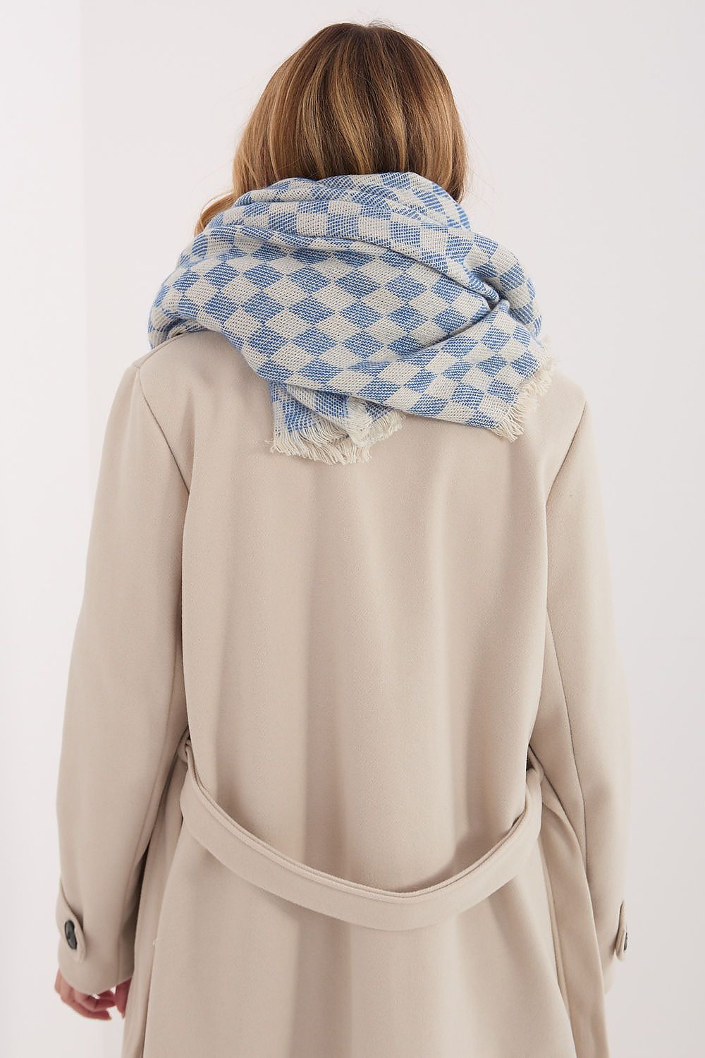 Close-up of the soft texture and geometric pattern of the AT shawl, showcasing its high-quality viscose and wool blend.