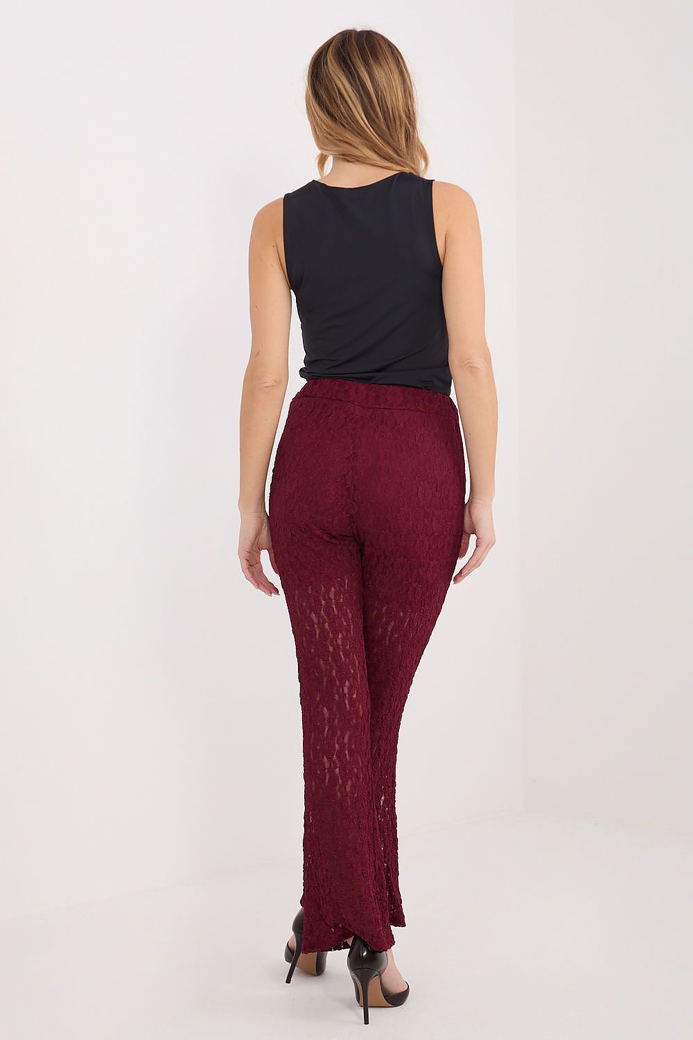 Close-up image of Italy Moda's Elegant Women's Lace Trousers featuring exquisite lace texture and minimalist waistband.