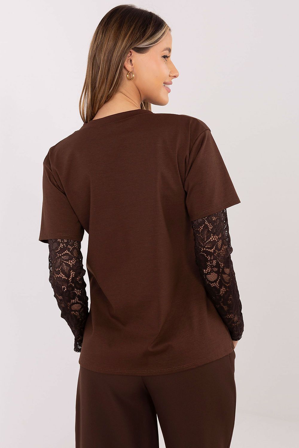Elegant Women's Blouse in a serene setting, emphasizing its versatility and comfort for casual occasions, by Italy Moda.