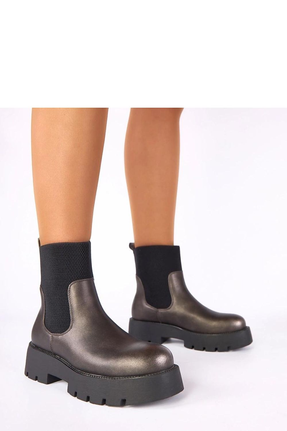 Solea Berniece Metallic Platform Ankle Boots showcasing a luxurious metallic finish ideal for fashionable women, featuring a flexible upper for comfort.