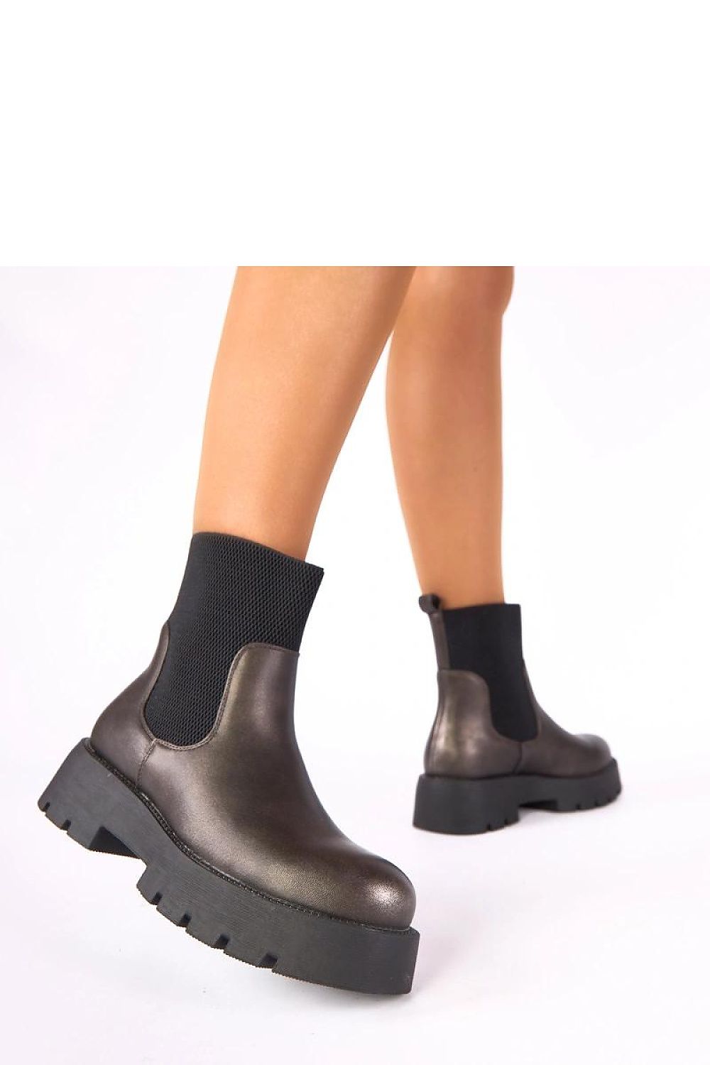Solea Berniece Metallic Platform Ankle Boots paired with elegant outfits, demonstrating versatility and fashion-forward style for women.