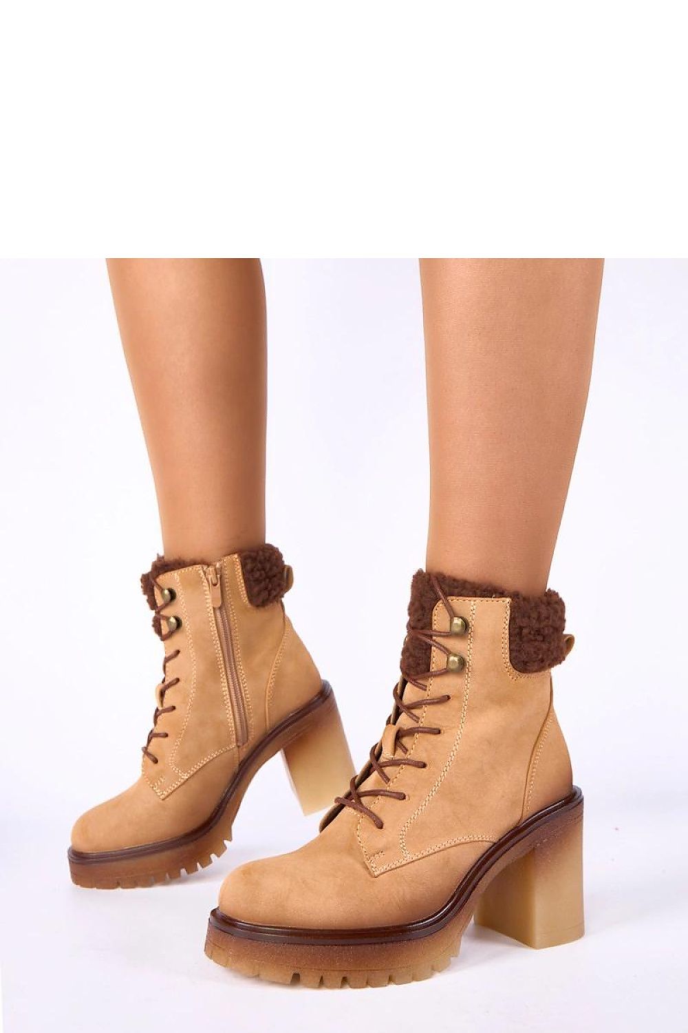 Close-up view of Gemre Alona ankle boots by Solea, featuring soft fur lining for added comfort and refined look in stylish beige.