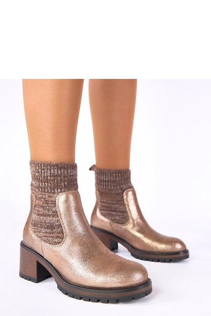 Luxurious Solea black ankle boots with sock-like upper, featuring a stylish 6cm heel, perfect for a chic autumn wardrobe.