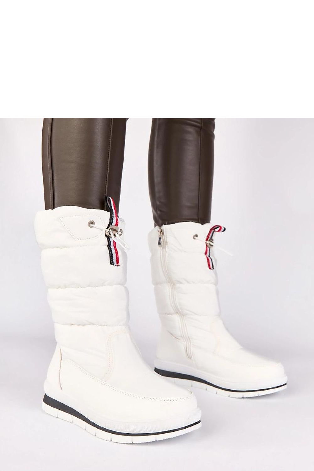 Solea women's elegant white low wedge snow boots with drawstring, showcasing a stylish design perfect for winter fashion, ideal for city wear and snowy getaways.