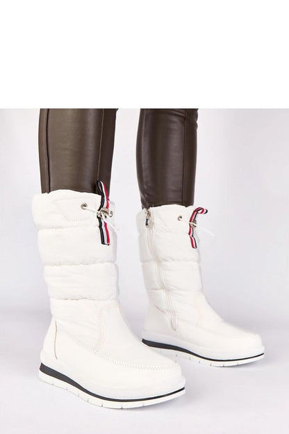 Solea women's elegant white low wedge snow boots with drawstring, showcasing a stylish design perfect for winter fashion, ideal for city wear and snowy getaways.