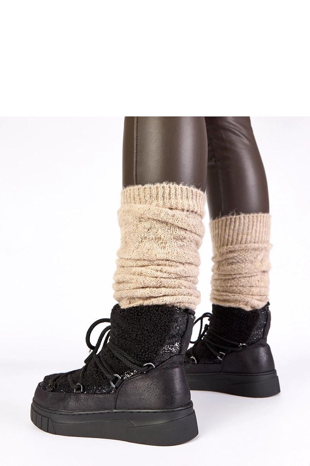 Solea women's elegant black snow boots with brocade fur, showcasing luxurious design and perfect for winter wear.