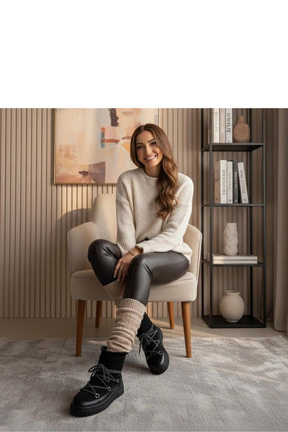 Close-up of Solea Esmee Women's Black Lace-Up Snow Boots, showcasing high-quality materials and luxurious fur lining for optimal warmth.