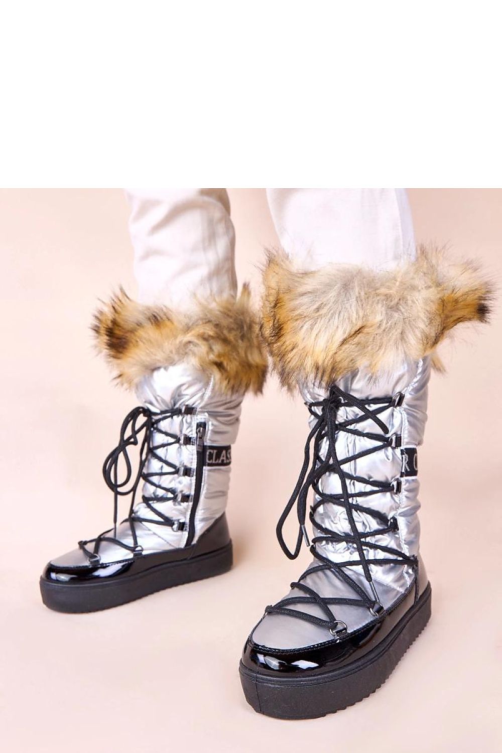 Solea luxury women's snow boots with fur, showcasing the elegant silver finish and non-slip sole for comfortable winter wear.