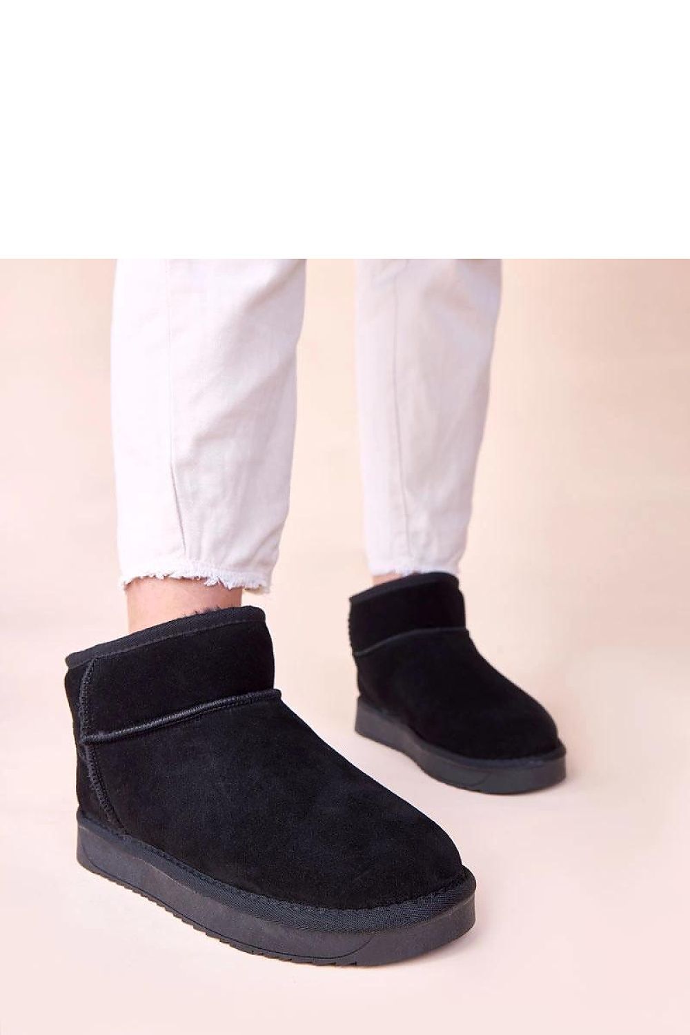 Elegant Gemre women's black suede snow boots with faux fur lining, designed for comfort and warmth, perfect for winter adventures.