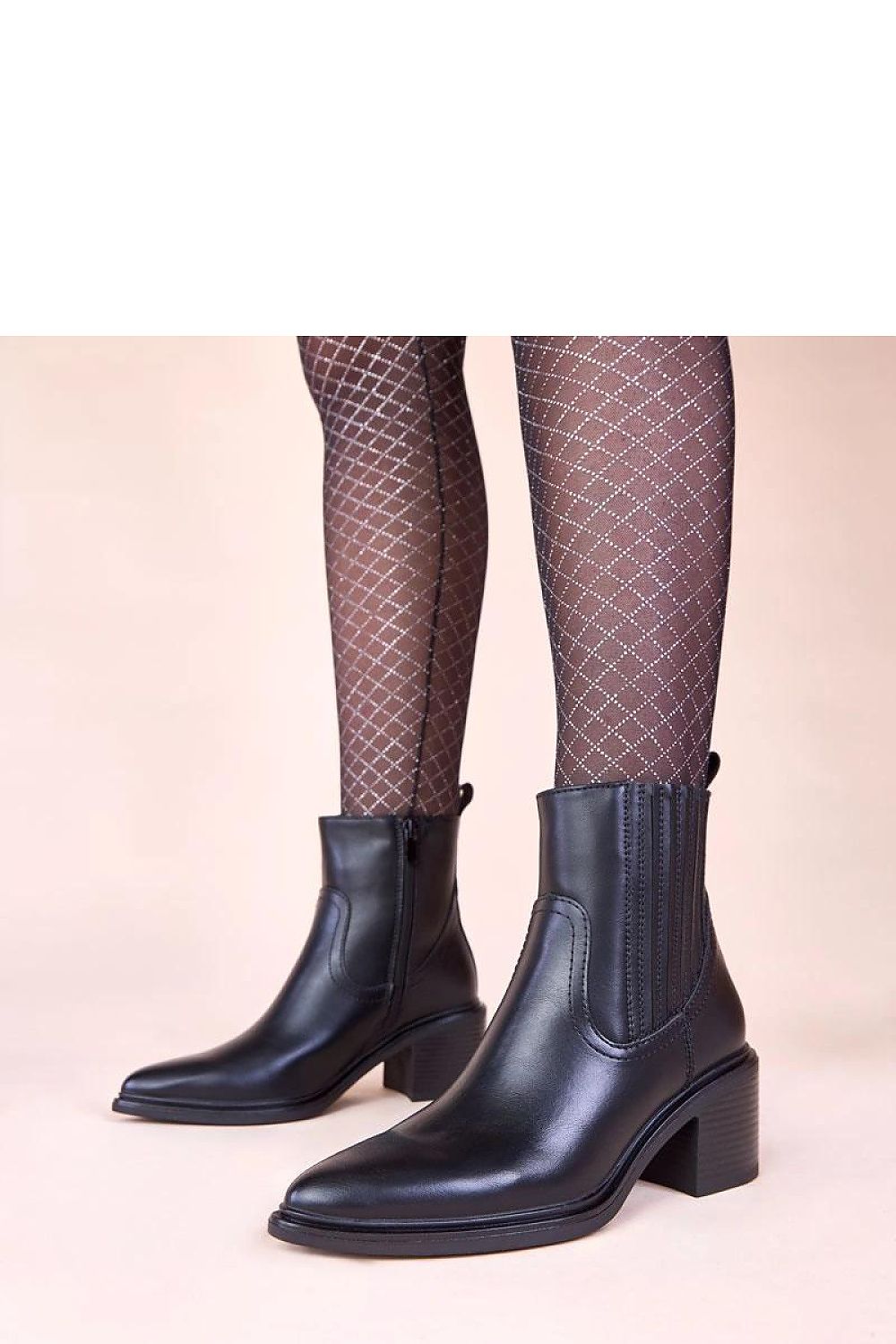 Elegant black ankle boots by Solea featuring a stylish block heel and elastic insert, perfect for luxurious comfort and versatility in any wardrobe.