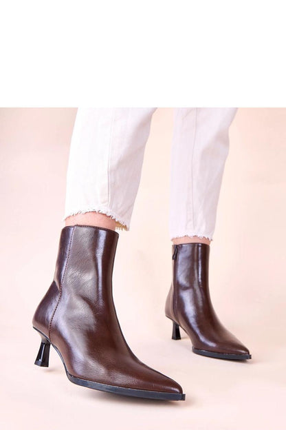 Detailed view of Gemre Mordi brown stiletto ankle boots, emphasizing the comfortable footbed and stylish 5cm heel, ideal for all-day wear.