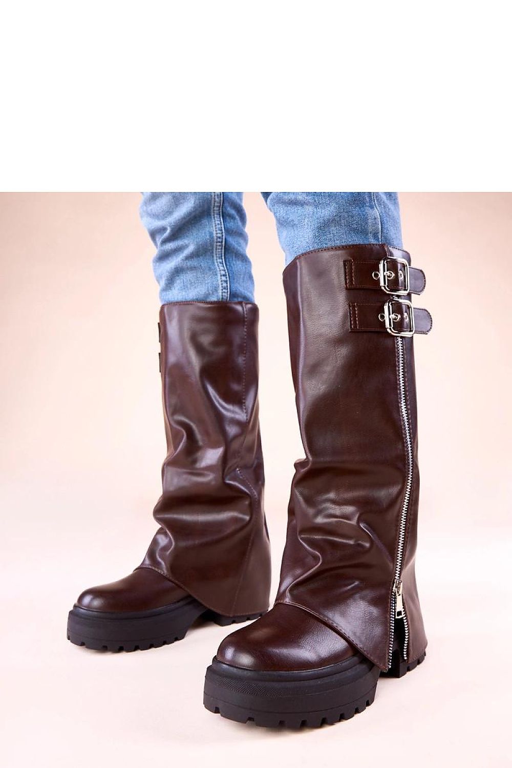 Luxurious Solea chocolate platform boots featuring stylish buckles and a rolled-up upper, designed for elegance and comfort in sizes EU 36-41.
