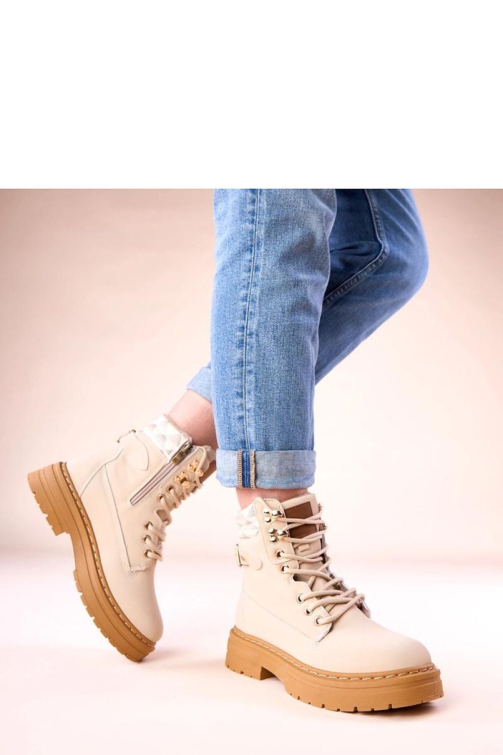 Close-up of Solea's beige suede trapper shoes, highlighting the luxurious craftsmanship and environmentally friendly materials.