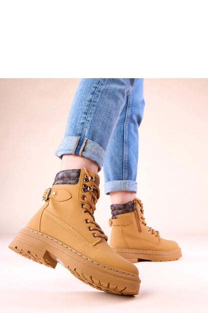 Solea beige insulated trappers displayed stylishly, offering comfort and warmth for women who value fashion and practicality in cooler weather.