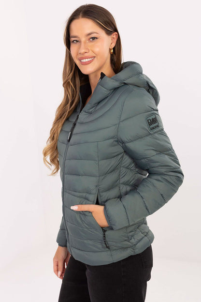 Close-up of Sublevel's lightweight and stylish women's quilted transitional jacket, highlighting the high-quality polyamide fabric.