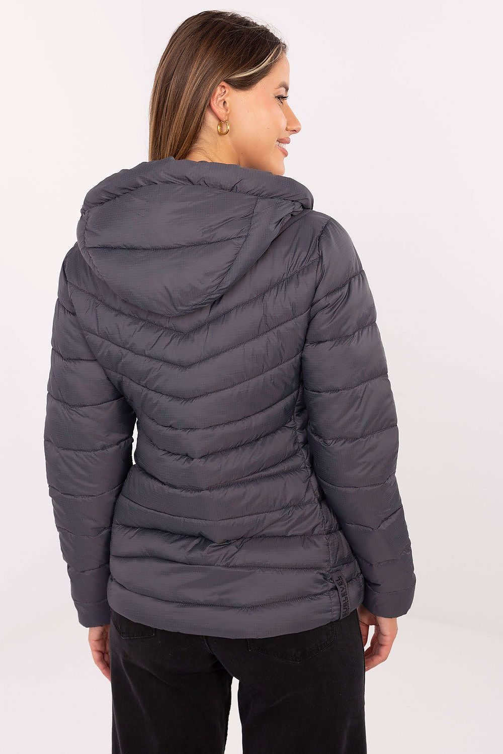 Sublevel's luxurious women's quilted jacket displayed in multiple sizes, perfect for versatile styling in any season.