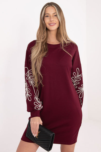 Elegant casual daydress by Rue Paris featuring embroidered sleeves and a soft, stretchy fabric blend of viscose and spandex, perfect for sophisticated everyday wear.