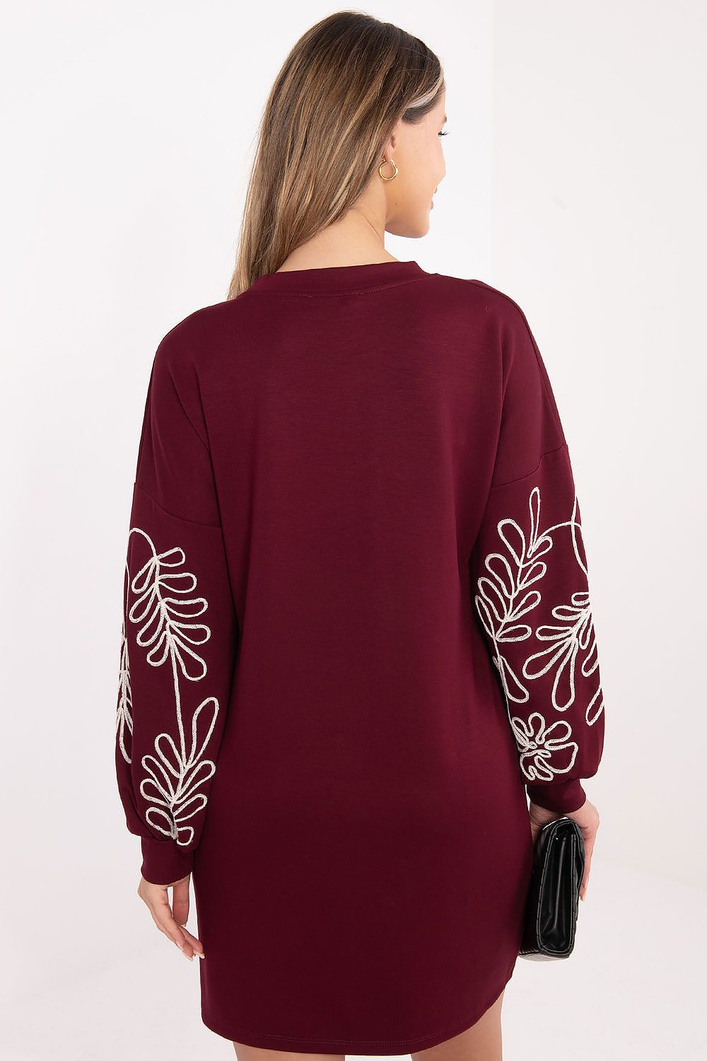 Model wearing the Rue Paris elegant casual daydress with long sleeves, round neckline, and hidden side pockets, demonstrating its versatility and stylish comfort.