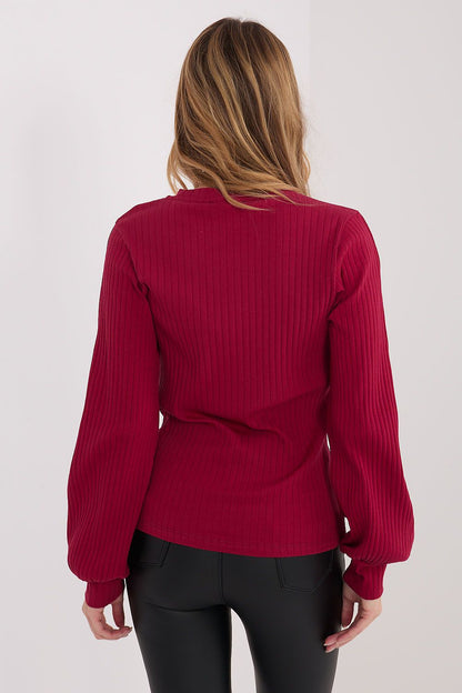 Close-up of Rue Paris striped blouse showcasing intricate embroidery and soft cotton blend fabric, designed for comfort and sophistication.