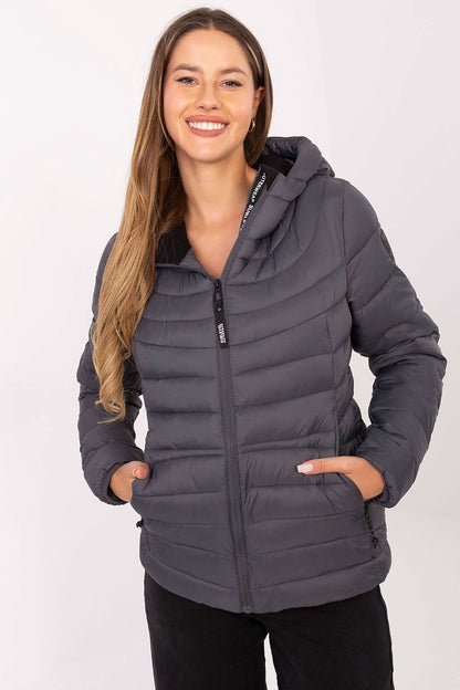 Luxurious women's quilted transitional jacket by Sublevel with hood, perfect for fall and winter. Lightweight and stylish design.