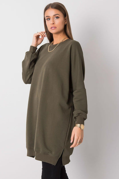 A charming look at the chic long-sleeve design of Relevance's daydress, effortlessly blending comfort and style for everyday elegance.