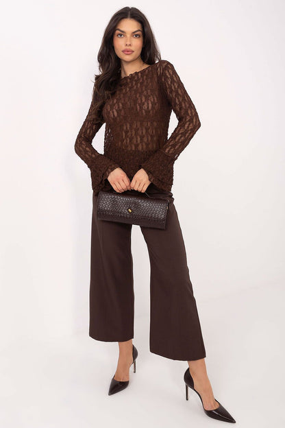 Chic lace blouse by Italy Moda, highlighting ruffled bell sleeves and premium fabric, ideal for elegant evening occasions.