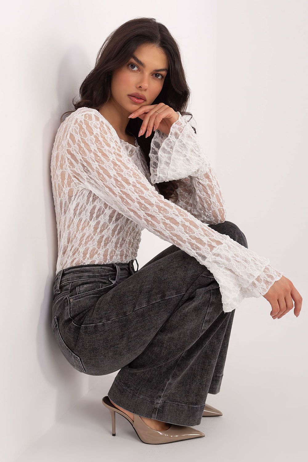 Versatile elegant lace blouse by Italy Moda displayed in EU 0 size, perfect blend of comfort and style for chic evening meetings and family celebrations.