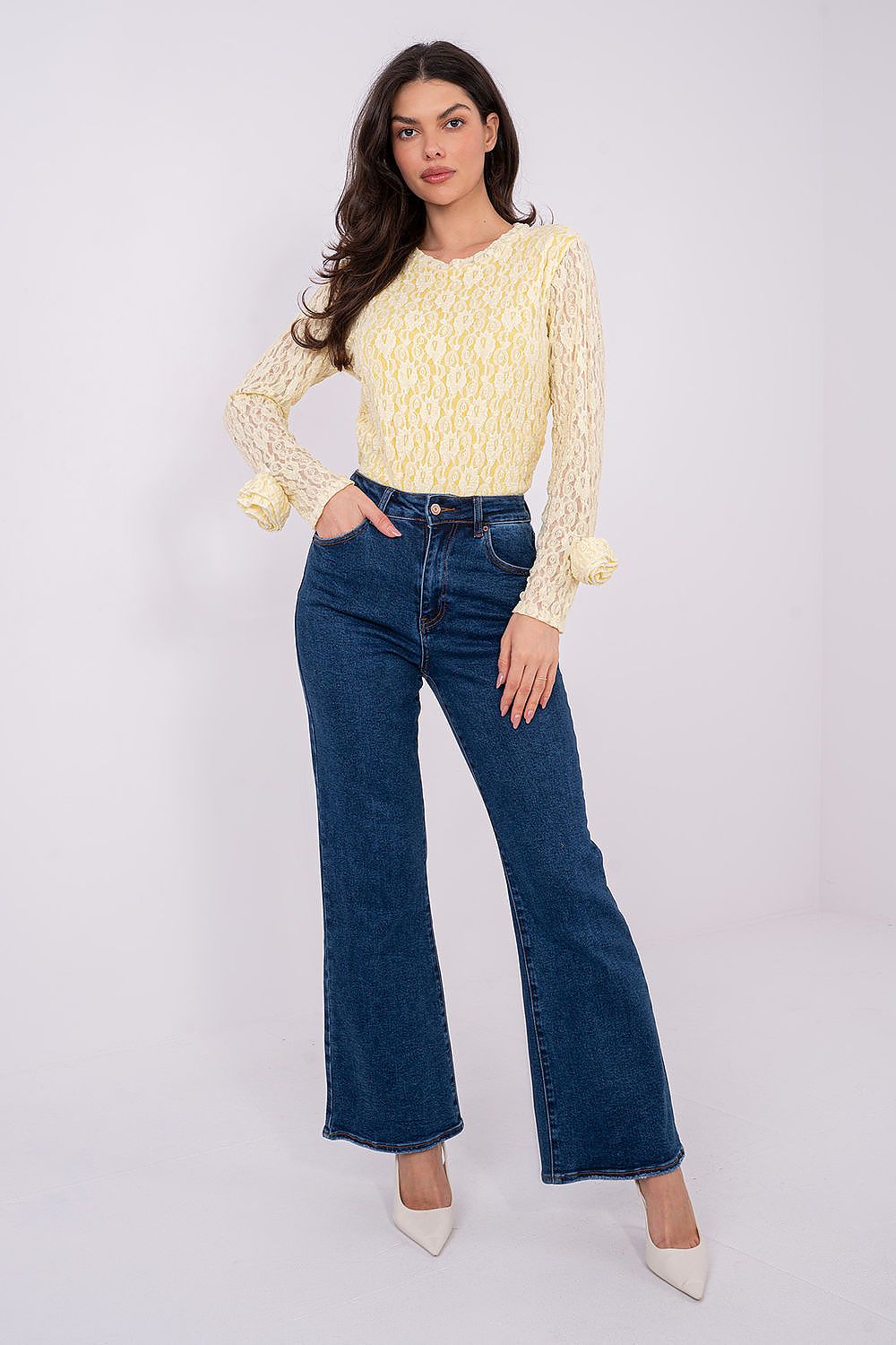 Close-up of the intricate lace texture on the elegant blouse by Italy Moda, highlighting its feminine charm and quality.