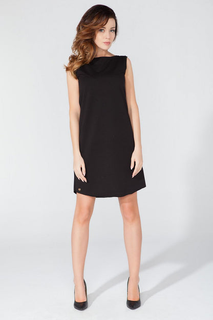 Elegant Knitted Daydress by Tessita displayed from the front, emphasizing its luxurious knitted fabric and sophisticated silhouette, offered in sizes S to XXXL.