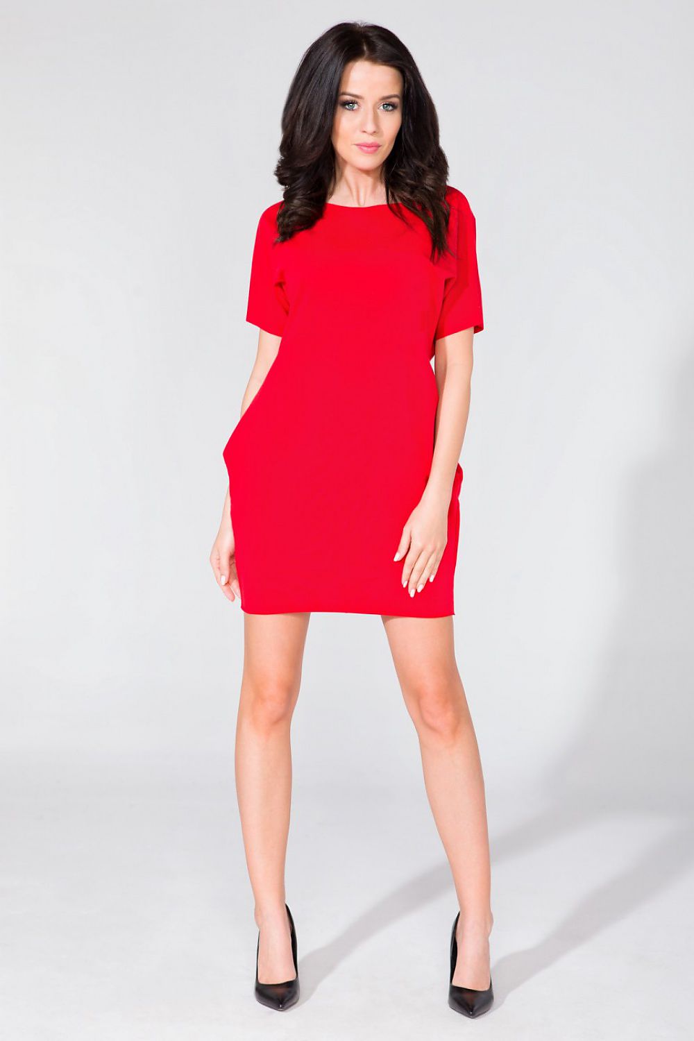 Close-up of the raw neckline detail on the Tessita Daydress, showcasing its sophisticated yet casual elegance.