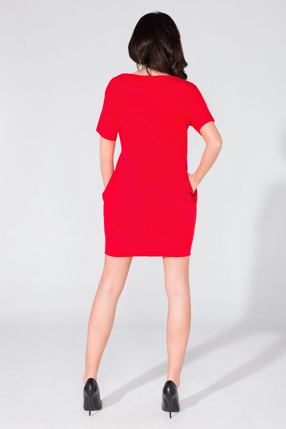 Stylish Tessita Daydress displayed on a model, highlighting the flattering wide cut and functional pockets.