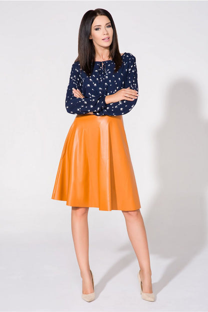 Elegant Tessita Blouse featuring a decorative teardrop and bow neckline in luxurious delicate fabric, perfect for sophisticated occasions.