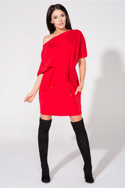Artistic view of Tessita Loose-Fitting Knitted Daydress with Large Pockets and Boat Neckline, accentuating the boat neckline design and spacious pockets.