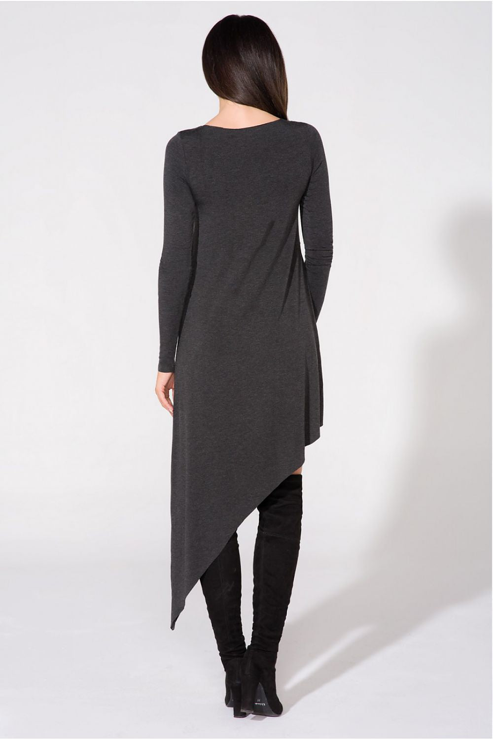 Close-up of the exquisite fabric texture of the Luxurious Asymmetrical Evening Dress by Tessita, highlighting the raw edges and premium knitwear quality.