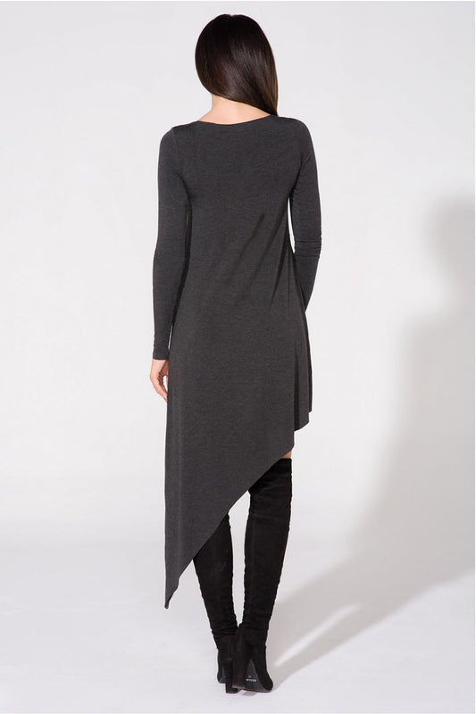 Close-up of the exquisite fabric texture of the Luxurious Asymmetrical Evening Dress by Tessita, highlighting the raw edges and premium knitwear quality.