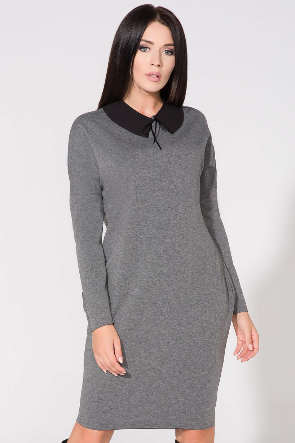 Elegant chic evening dress with pockets and raw edge detail by Tessita, showcasing luxurious cotton blend fabric.