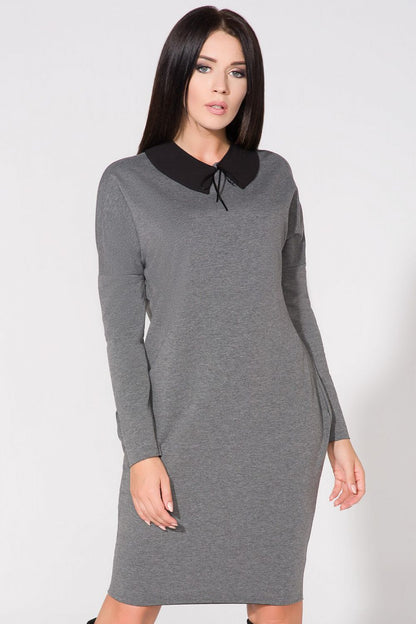 Elegant chic evening dress with pockets and raw edge detail by Tessita, showcasing luxurious cotton blend fabric.