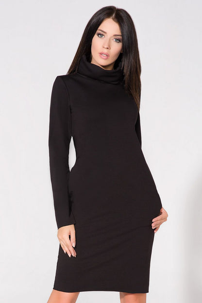 Model wearing the Elegant Knit Dress with Raw Edges and Seam Pockets by Tessita, exemplifying chic style and versatility.