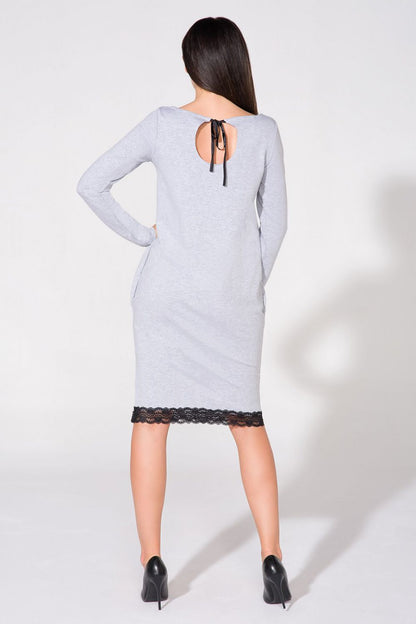 Elegant Tessita Daydress by Tessita highlighting a fashionable knitted design with luxurious lace and satin accents.