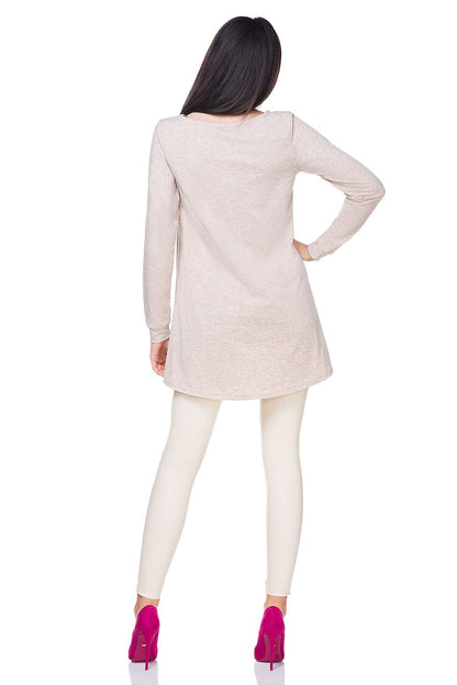 Model wearing the Luxury Soft Knitwear Blouse With Shiny Gold Thread by Tessita, styled as a chic loose-fitting tunic for sophisticated occasions.