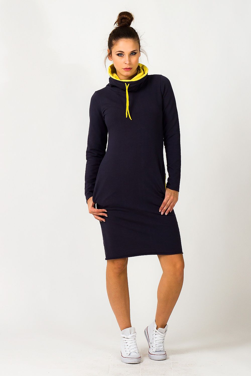 Stylish Sporty Tessita Daydress with lively patterns and a fashionable contrasting turtleneck collar, designed for a luxurious casual outfit.