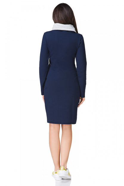 Elegant sporty daydress with turtleneck and pockets by Tessita, crafted in vibrant knitted colours, perfect for chic everyday wear.