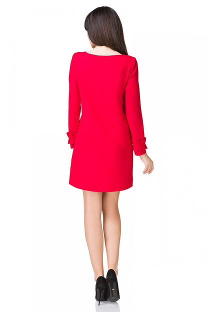 Close-up view of the Elegant Mini Dress featuring a Trapeze Cut, Drape Neckline, and Frilled Long Sleeves by Tessita, highlighting intricate design details.