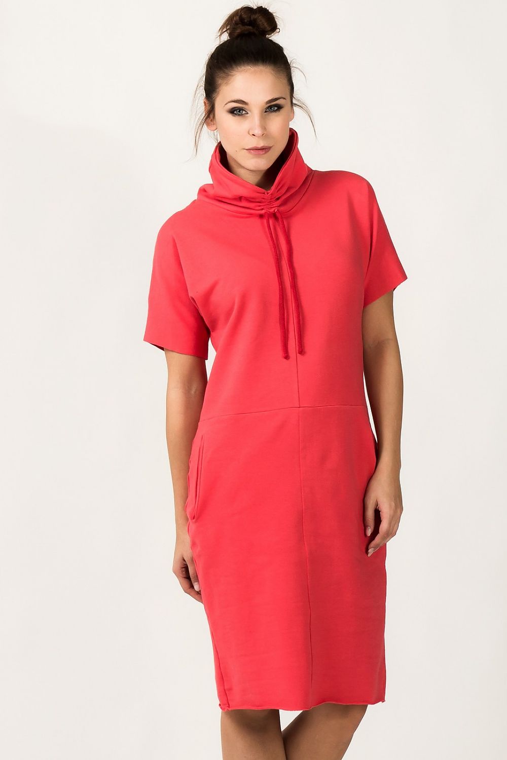 Elegant Tessita Luxury Knit Turtleneck Daydress with Pockets, showcasing a loose fit and short sleeves, perfect for a relaxed yet stylish look.
