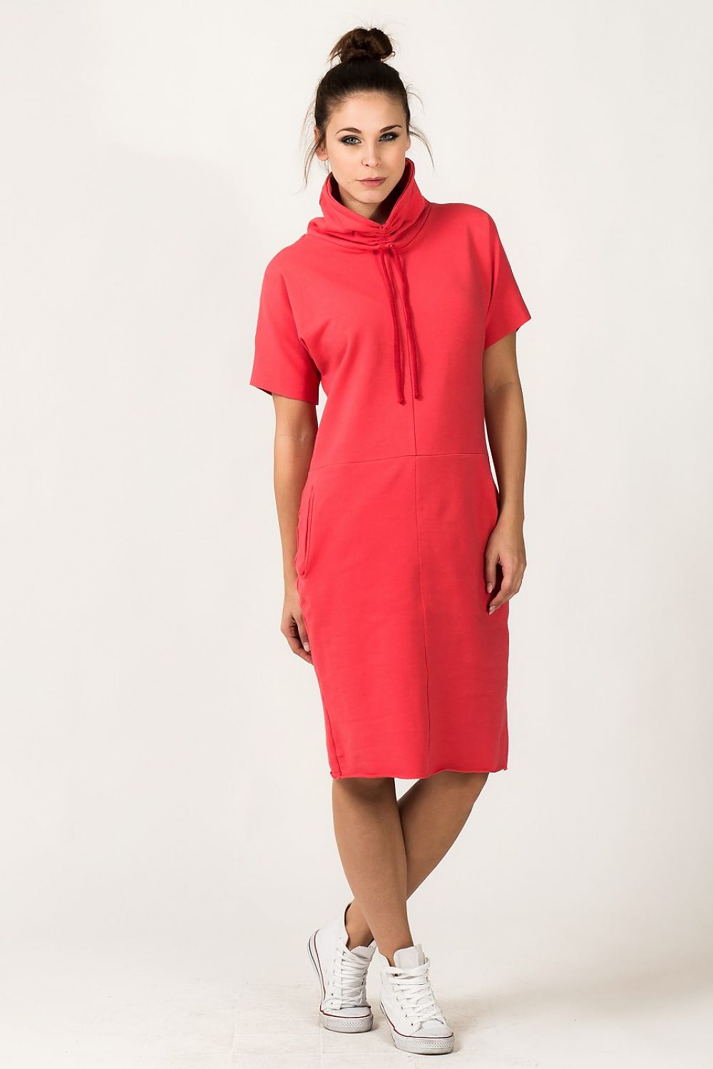 Sophisticated image of Tessita Luxury Knit Turtleneck Daydress, featuring a beautiful drape and two practical pockets, ideal for everyday luxury.