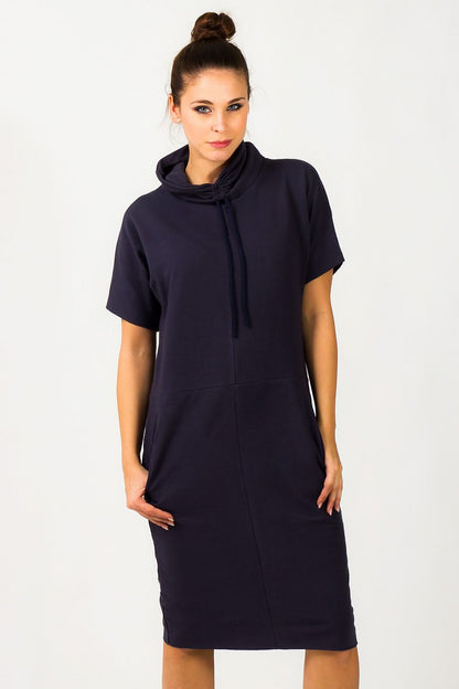 Stunning Tessita Luxury Knit Turtleneck Daydress with Pockets, epitomising comfort and style with a modern oversized silhouette and soft cotton blend.