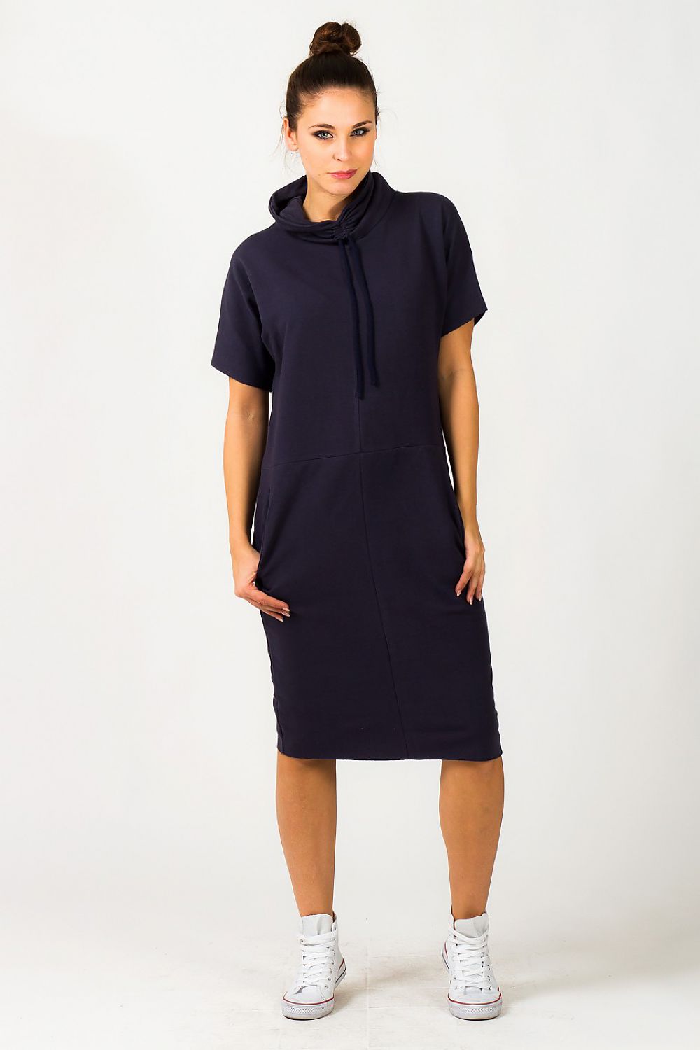 Elegant Tessita Luxury Knit Turtleneck Daydress with Pockets in a loose fit, showcasing short sleeves and luxurious craftsmanship.