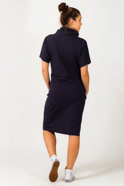 Sophisticated Tessita Luxury Knit Turtleneck Daydress with Pockets, featuring a relaxed silhouette and high-quality fabric, perfect for any occasion.