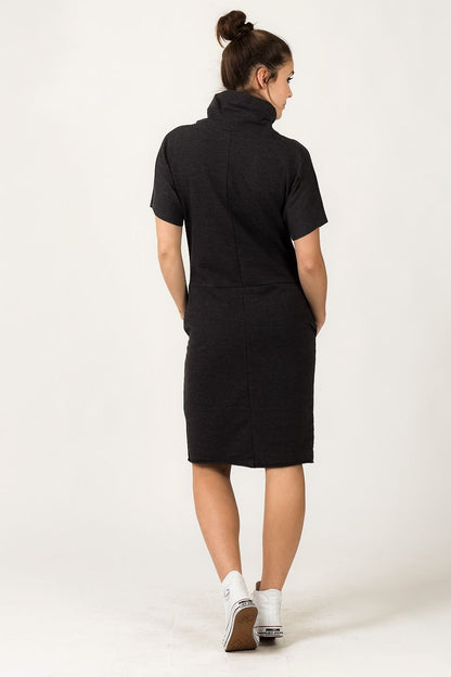 Trendy Tessita Luxury Knit Turtleneck Daydress with Pockets, perfect for layering and enhancing your wardrobe with luxury and comfort.