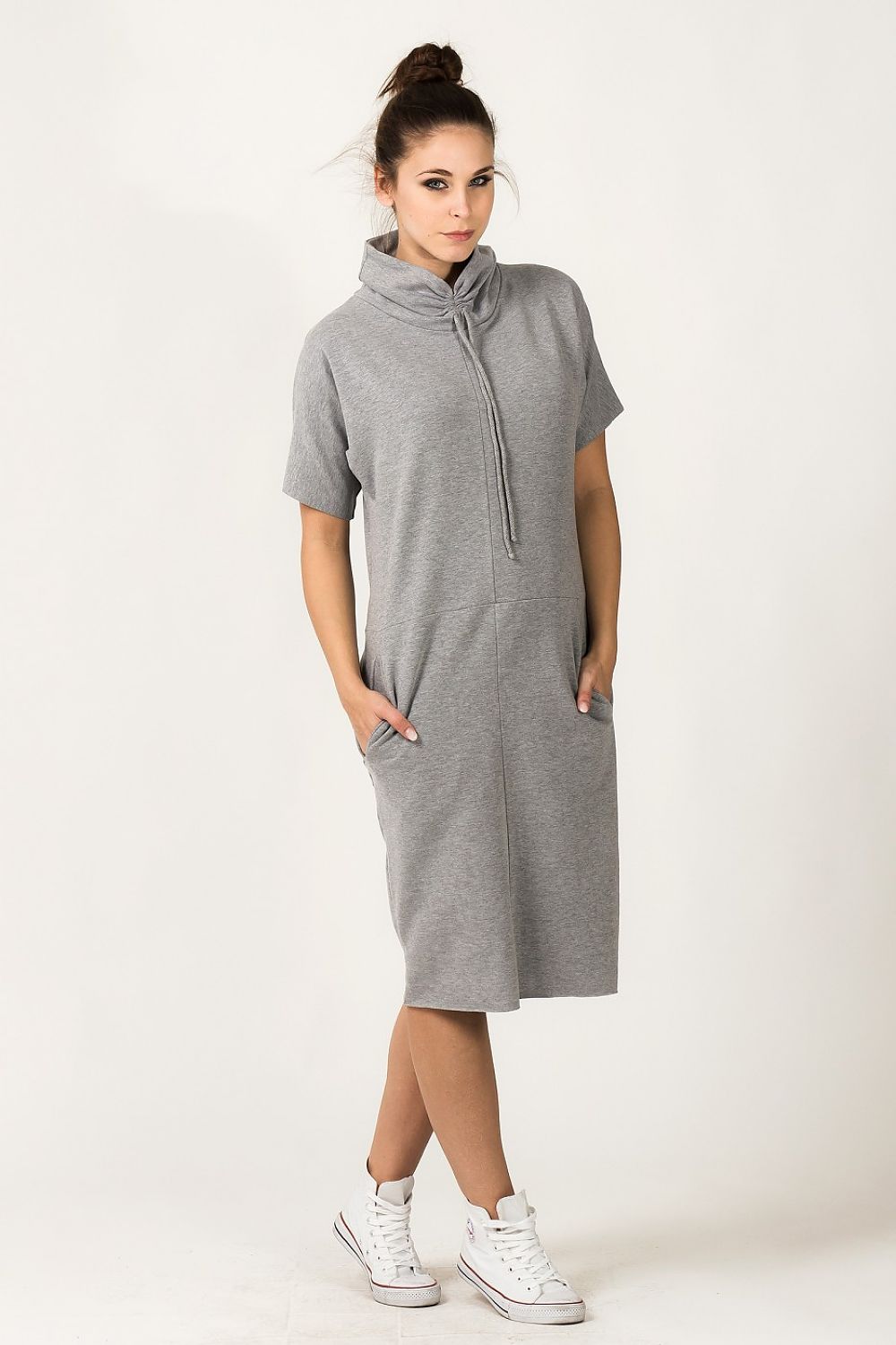 Tessita Luxury Knit Turtleneck Daydress with Pockets, highlighting the exquisite fabric and two front pockets, ideal for everyday elegance.